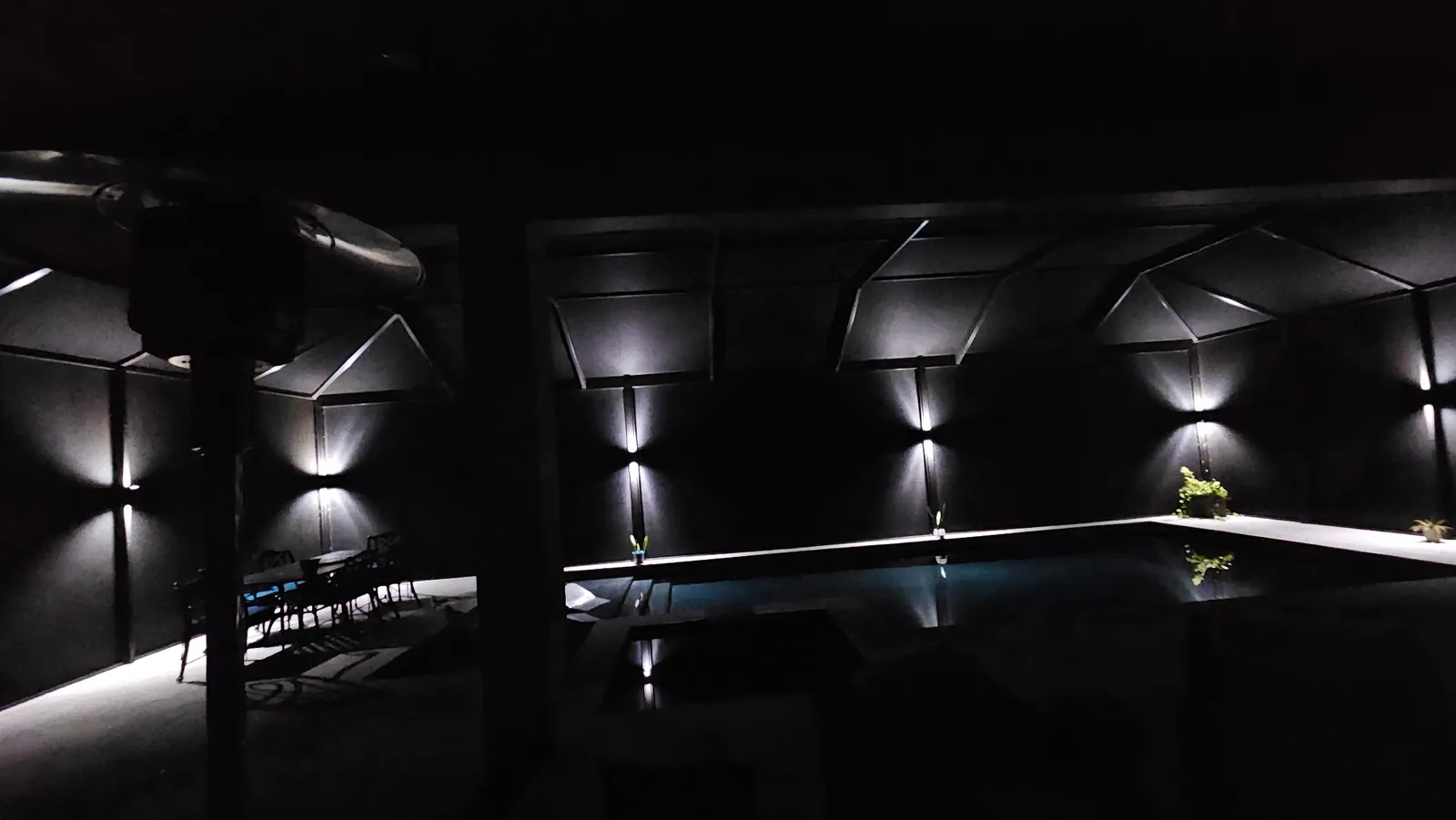 Cool white over the pool after dark