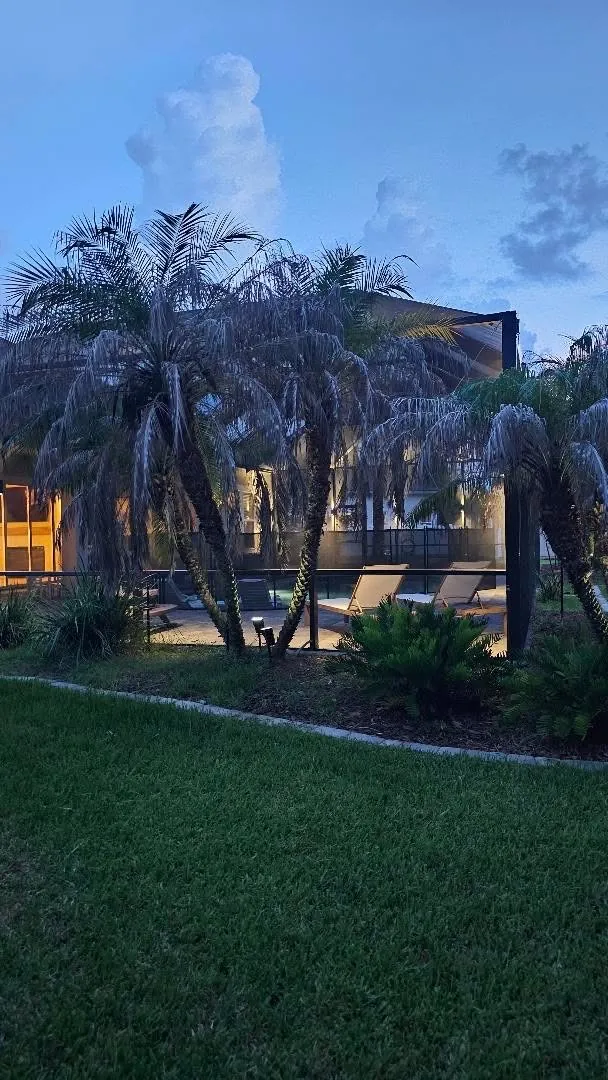 A lit path leading to the door