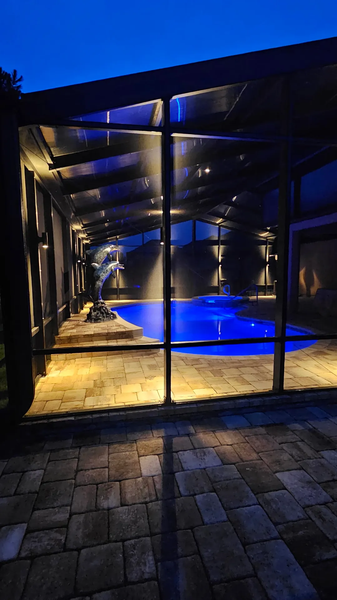 The walkway inside the frame, up-down sconces on every upright